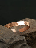Handslegið kopararmband